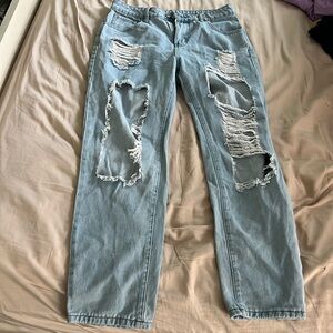 Very Distressed Light Wash Skinny Blue Jeans